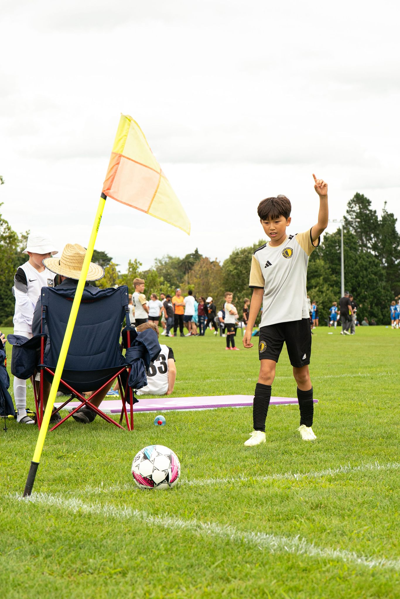 Only Ballers player taking corner kick at tournament